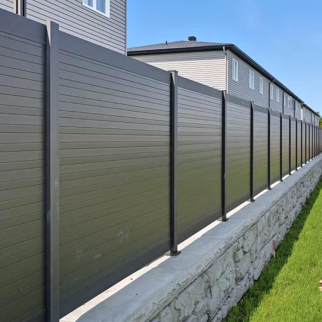 modern aluminum fence installation on an Alberta residential property